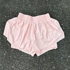 Light pink shorts, has built in shorts and are very comfortable.